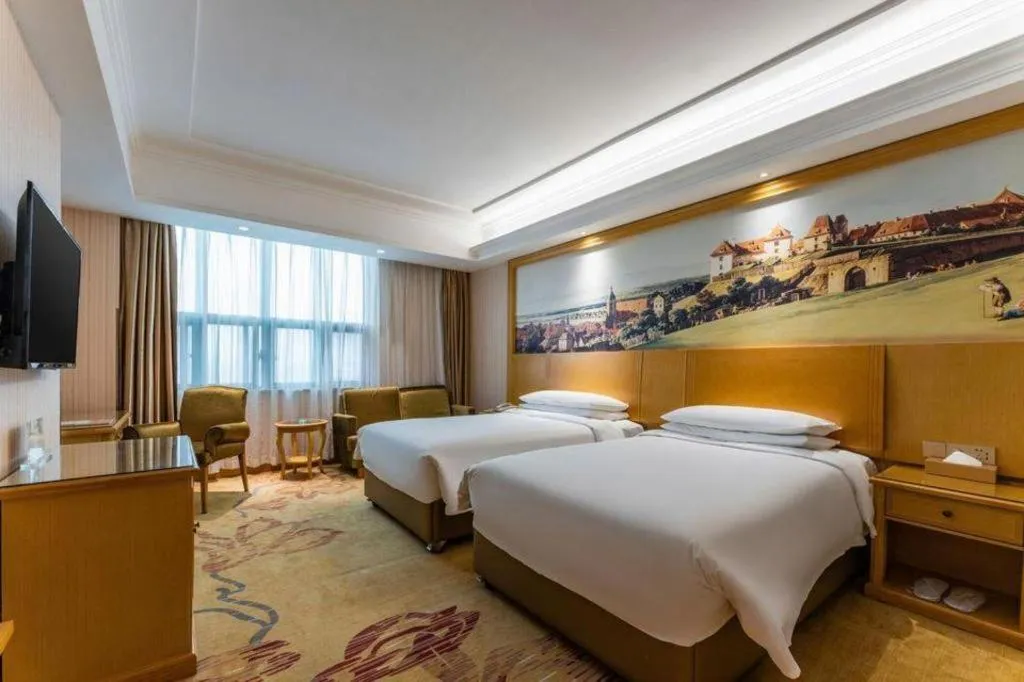 Bed in Vienna Hotel Hubei Xiangyang Tang City Gulou