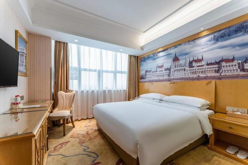 Bed in Vienna Hotel Hubei Xiangyang Tang City Gulou