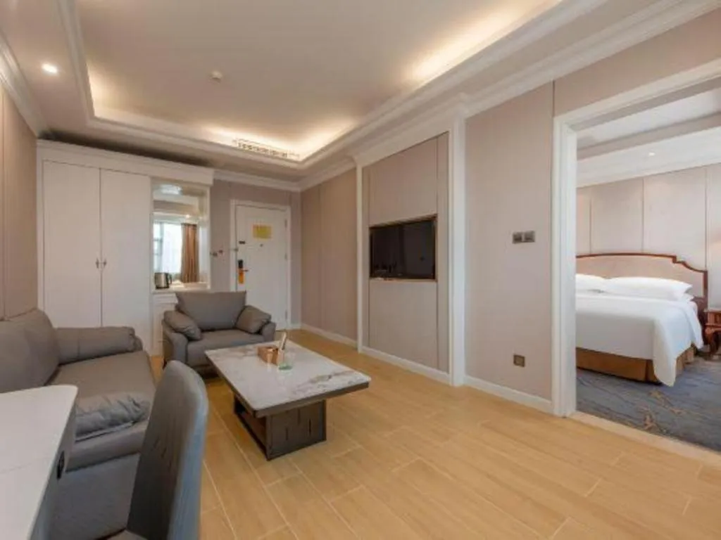 Bed in Vienna Hotel Guangzhou Baiyun College Jinyuan Plaza