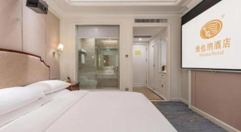 Bed in Vienna Hotel Guangzhou Baiyun College Jinyuan Plaza