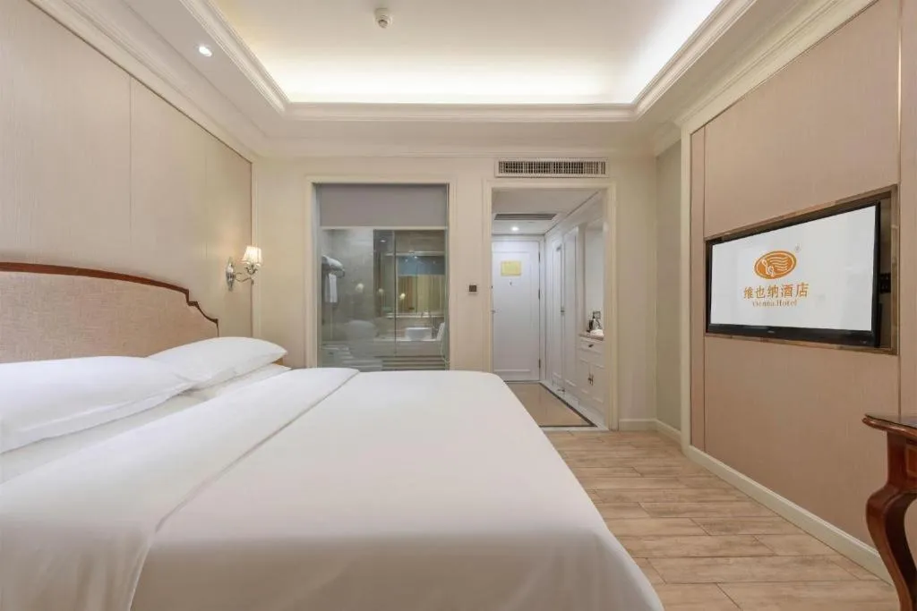 Bed in Vienna Hotel Guangzhou Baiyun College Jinyuan Plaza