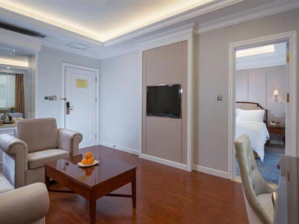 Bed in Vienna Hotel Guangzhou Baiyun College Jinyuan Plaza