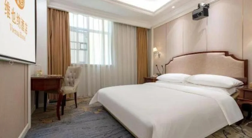Bed in Vienna Hotel Guangzhou Baiyun College Jinyuan Plaza
