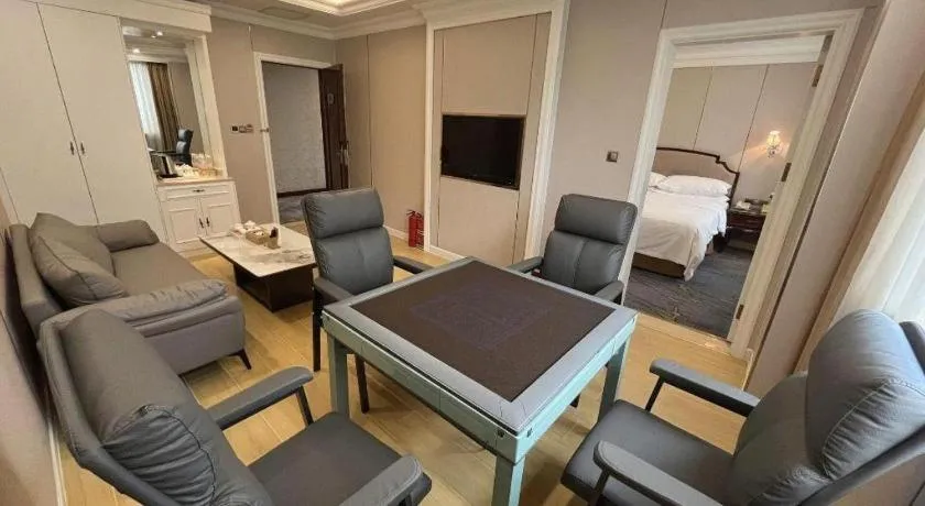 Bed in Vienna Hotel Guangzhou Baiyun College Jinyuan Plaza