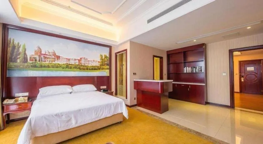 Bed in Vienna Hotel Jiangxi Ji'an Anfu