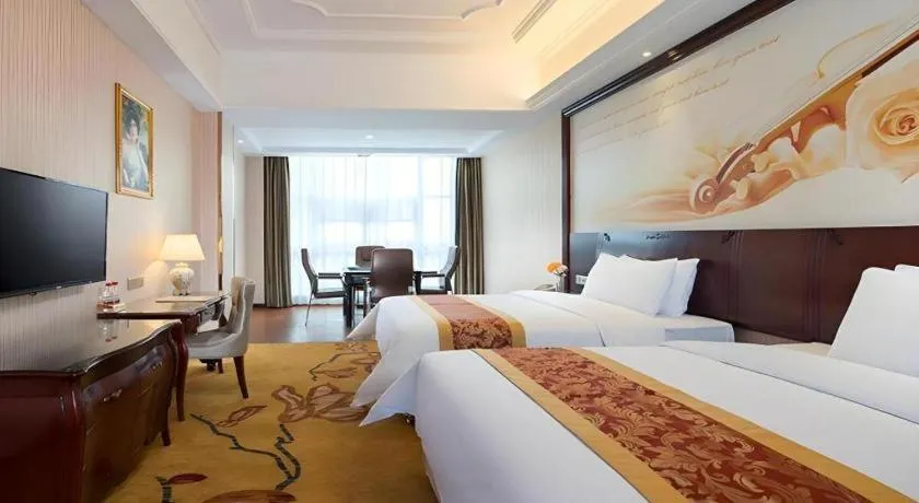 Bed in Vienna Hotel Jiangxi Ji'an Anfu