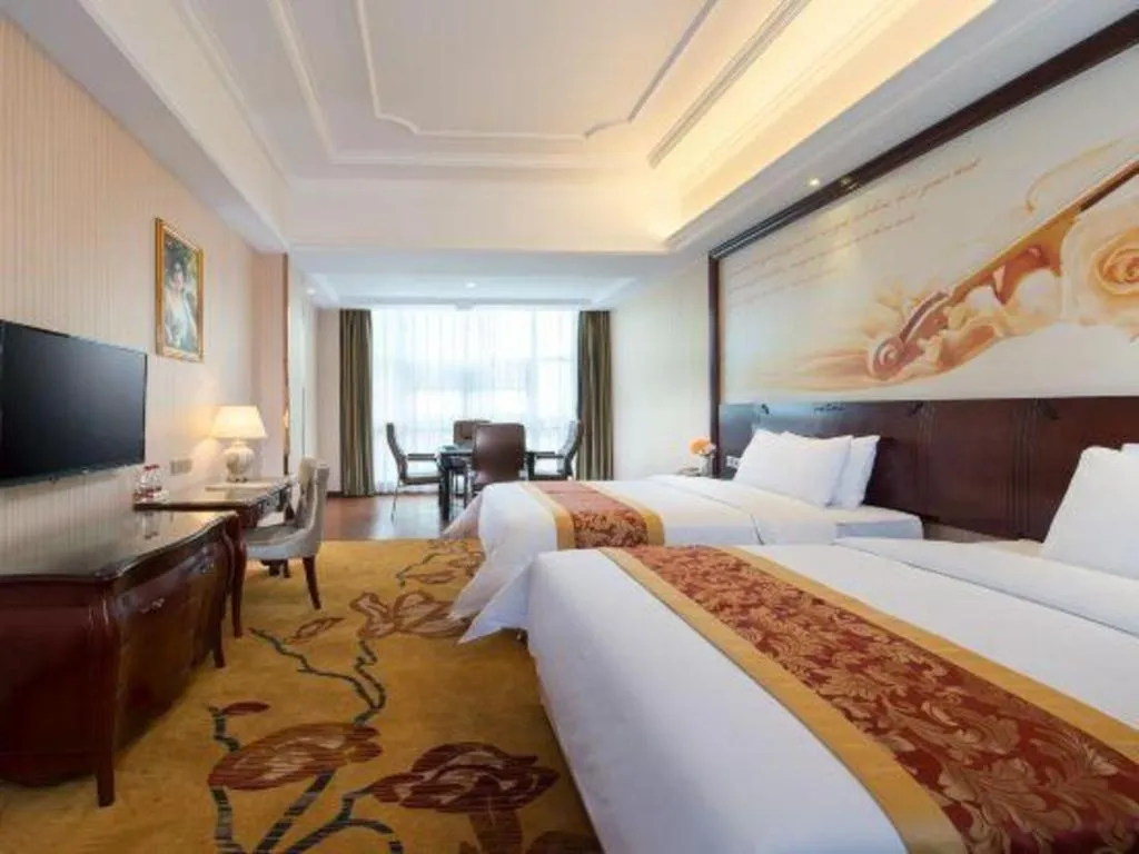 Bed in Vienna Hotel Jiangxi Ji'an Anfu