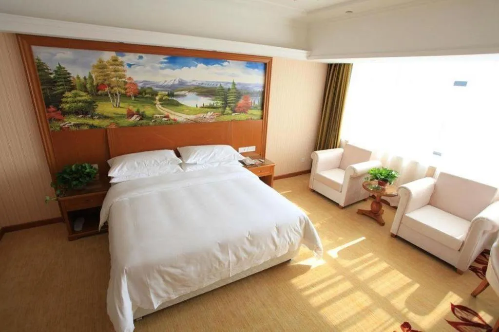 Bed in Vienna Hotel Jiangxi Ji'an Anfu