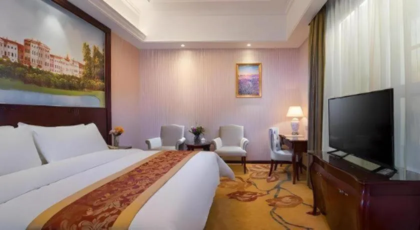 Bed in Vienna Hotel Jiangxi Ji'an Anfu