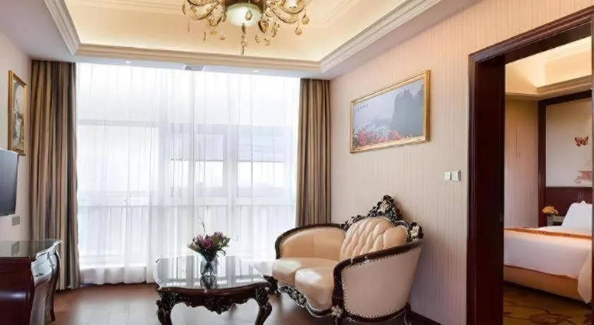 Bed in Vienna Hotel Jiangxi Ji'an Anfu