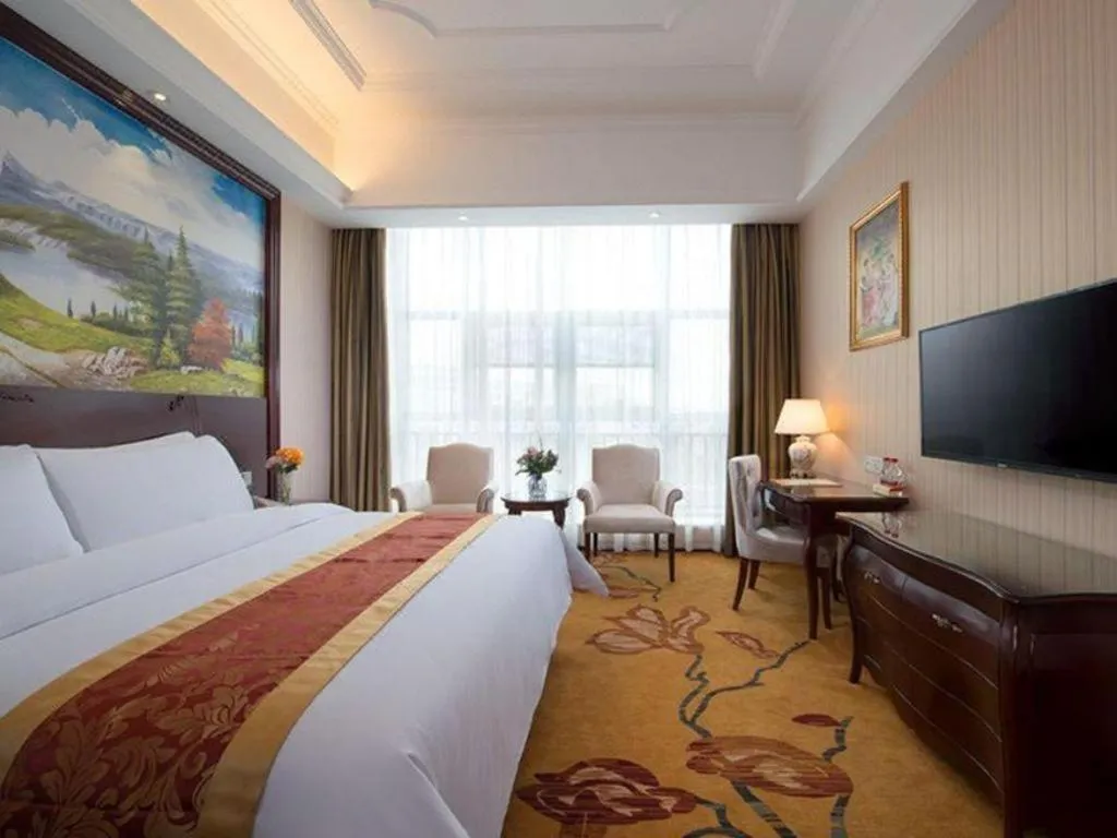 Bed in Vienna Hotel Jiangxi Ji'an Anfu