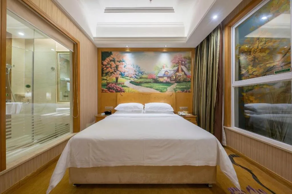 Bed in Vienna Hotel Jiangxi Ji'an Anfu