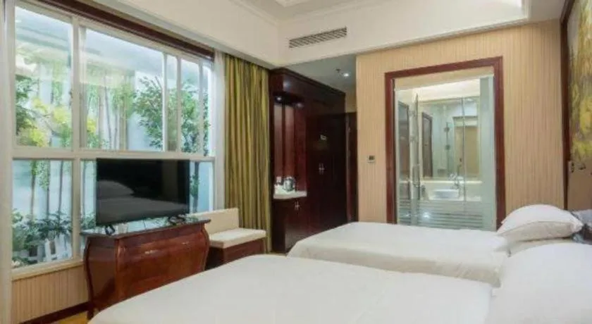 Bed in Vienna Hotel Jiangxi Ji'an Anfu