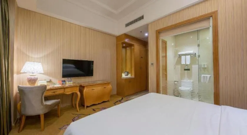 Bed in Vienna Hotel Jiangxi Ji'an Anfu