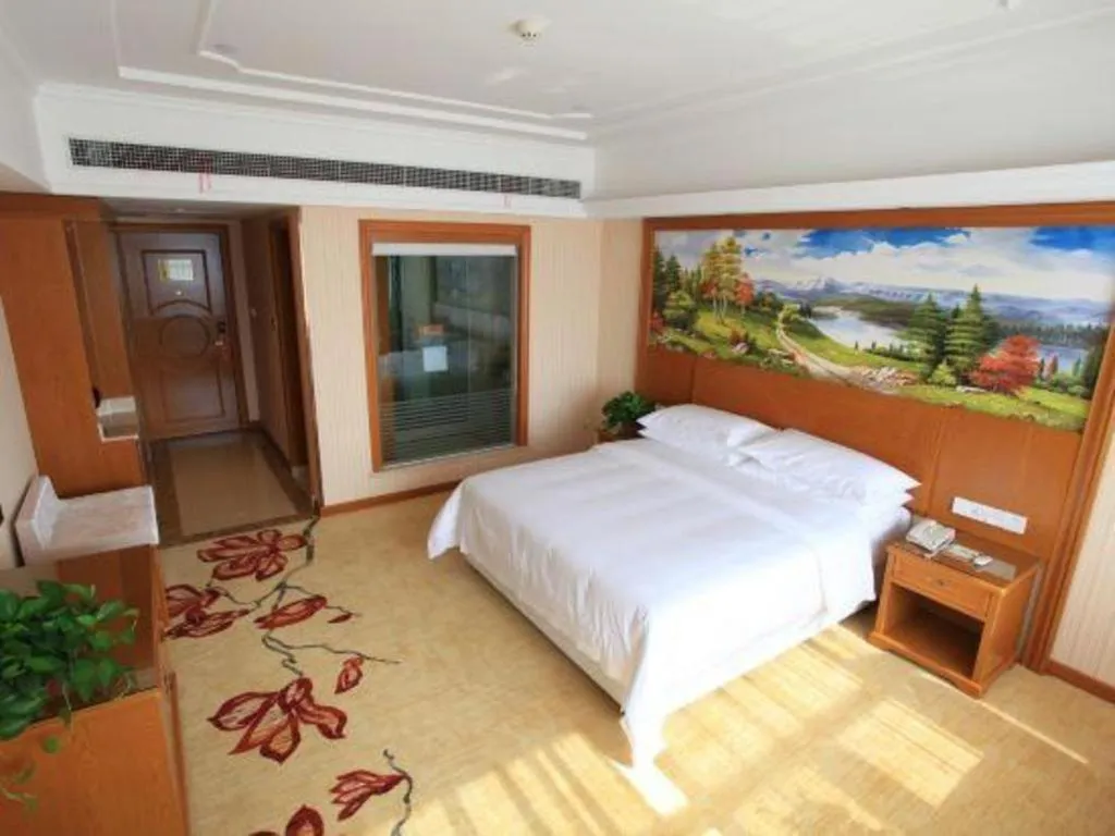 Bed in Vienna Hotel Jiangxi Ji'an Anfu