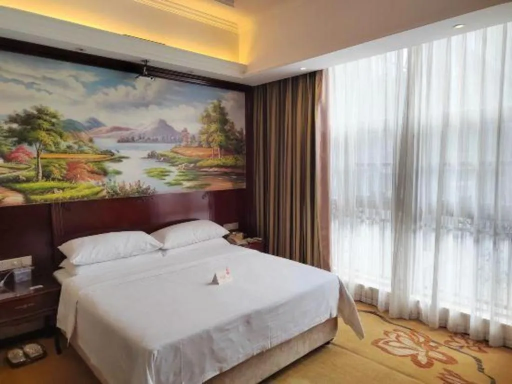 Bed in Vienna Hotel Jiangxi Ji'an Anfu