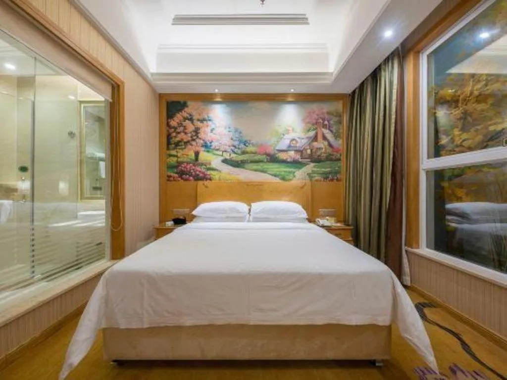 Bed in Vienna Hotel Jiangxi Ji'an Anfu