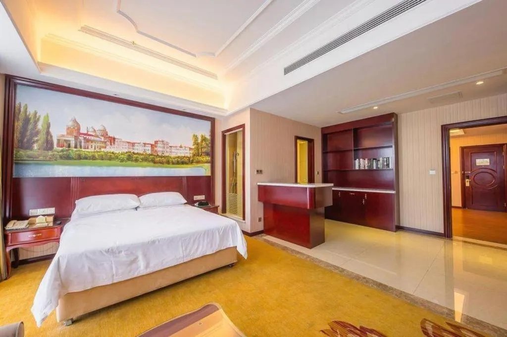 Bed in Vienna Hotel Jiangxi Ji'an Anfu