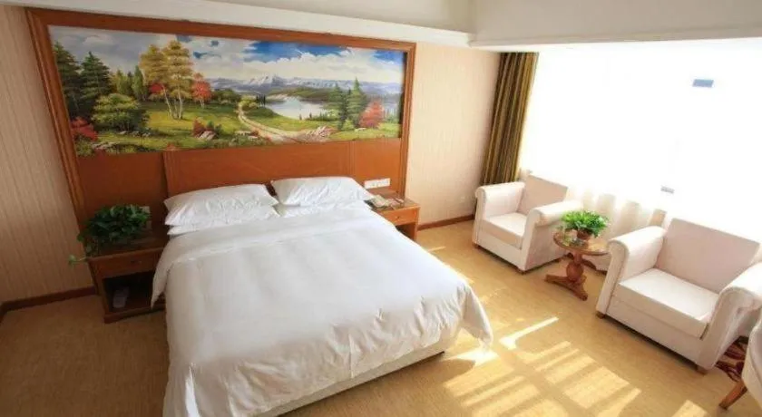 Bed in Vienna Hotel Jiangxi Ji'an Anfu