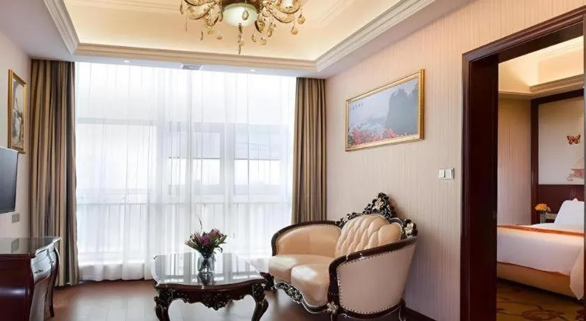 Bed in Vienna Hotel Jiangxi Ji'an Anfu