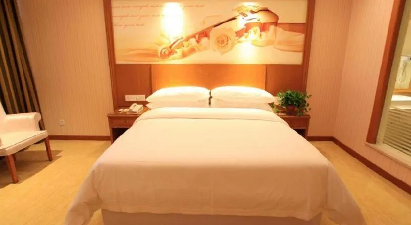 Bed in Vienna Hotel Jiangxi Ji'an Anfu