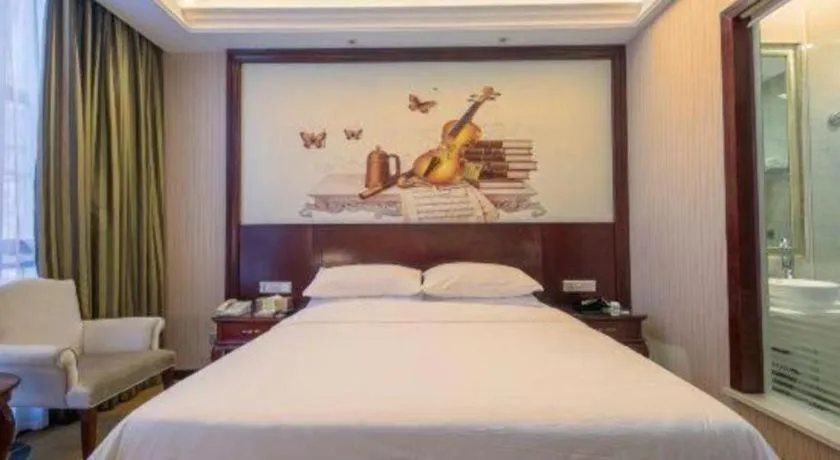 Bed in Vienna Hotel Jiangxi Ji'an Anfu