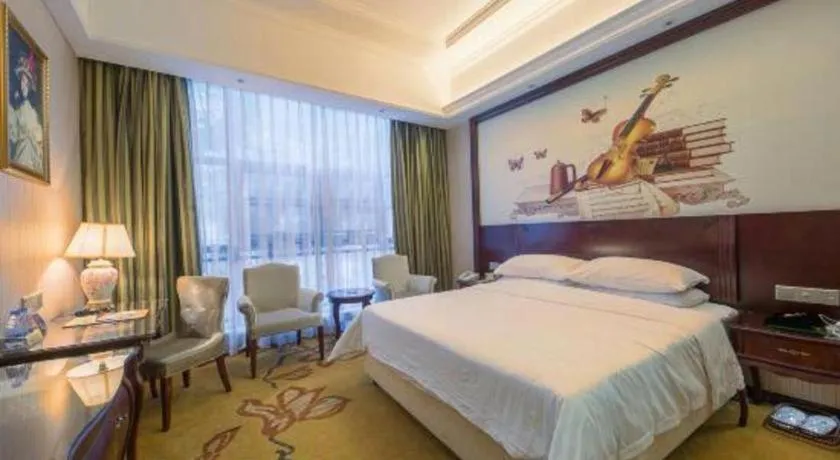 Bed in Vienna Hotel Jiangxi Ji'an Anfu