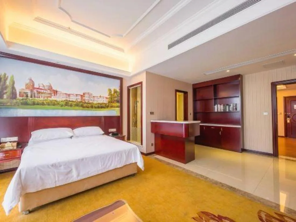 Bed in Vienna Hotel Jiangxi Ji'an Anfu