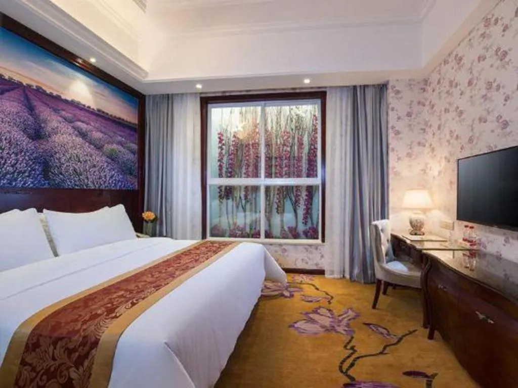 Bed in Vienna Hotel Jiangxi Ji'an Anfu