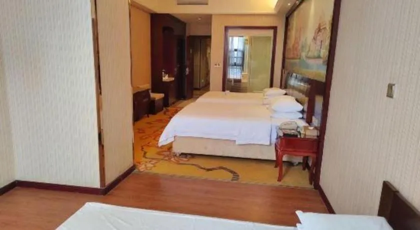 Bed in Vienna Hotel Jiangxi Ji'an Anfu