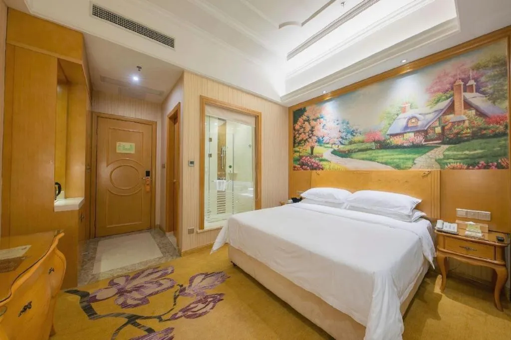 Bed in Vienna Hotel Jiangxi Ji'an Anfu