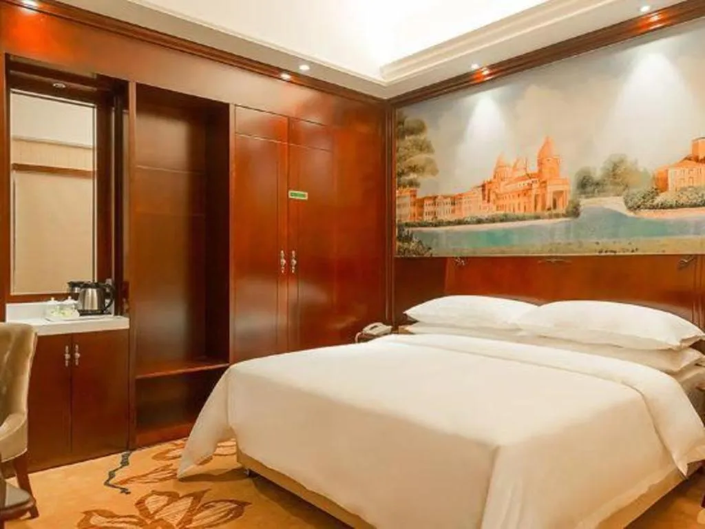 Bed in Vienna Hotel Jiangxi Ji'an Anfu