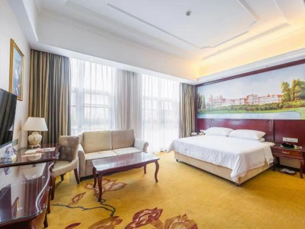 Bed in Vienna Hotel Jiangxi Ji'an Anfu