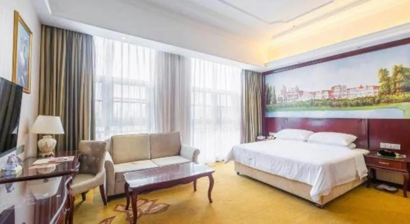 Bed in Vienna Hotel Jiangxi Ji'an Anfu