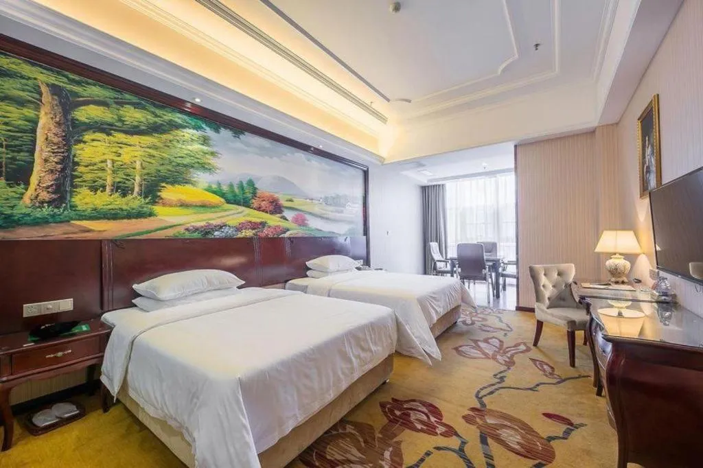 Bed in Vienna Hotel Jiangxi Ji'an Anfu