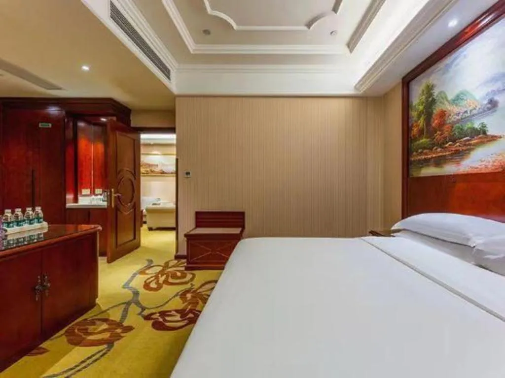 Bed in Vienna Hotel Jiangxi Ji'an Anfu