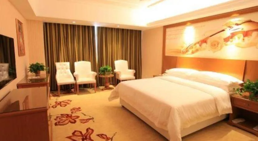 Bed in Vienna Hotel Jiangxi Ji'an Anfu
