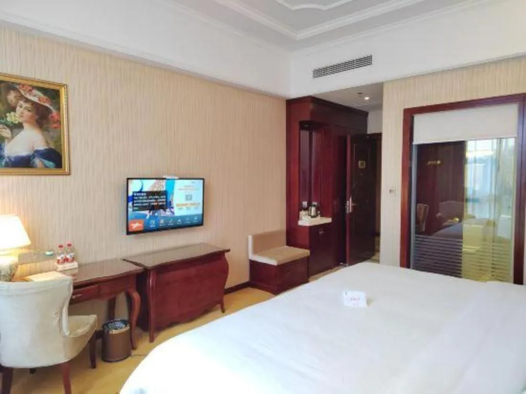 Bed in Vienna Hotel Jiangxi Ji'an Anfu