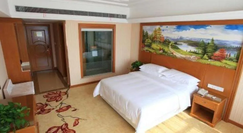 Bed in Vienna Hotel Jiangxi Ji'an Anfu