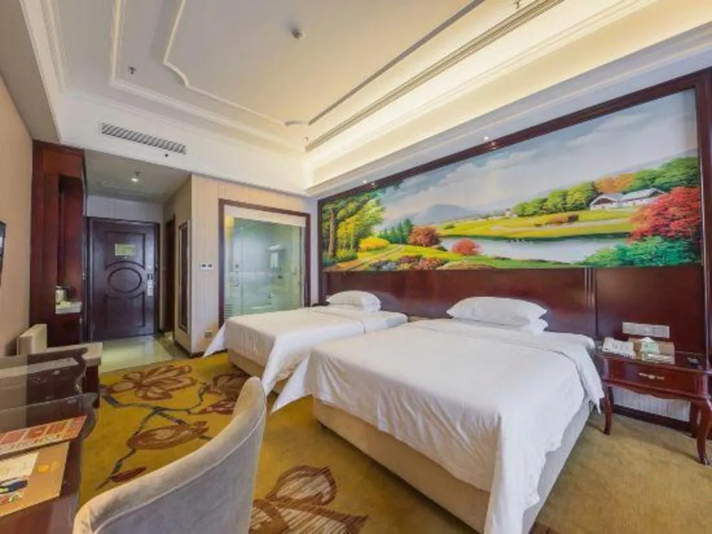 Bed in Vienna Hotel Jiangxi Ji'an Anfu