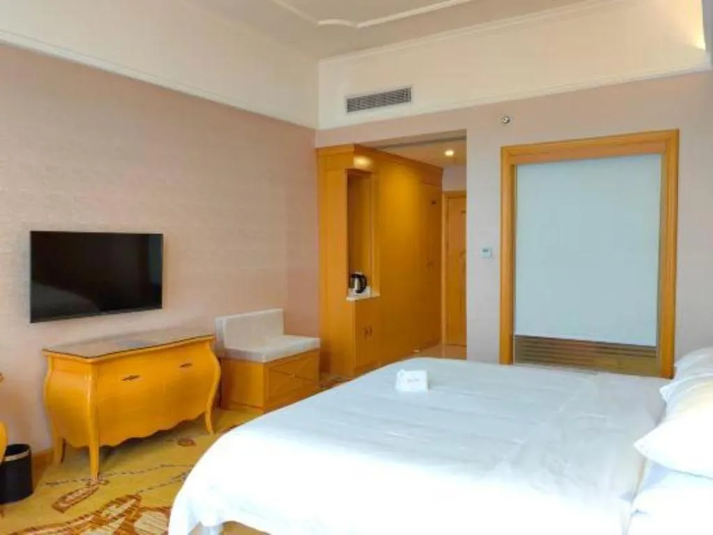 Bed in Vienna Hotel Guangdong Dongguan Chengnan Station