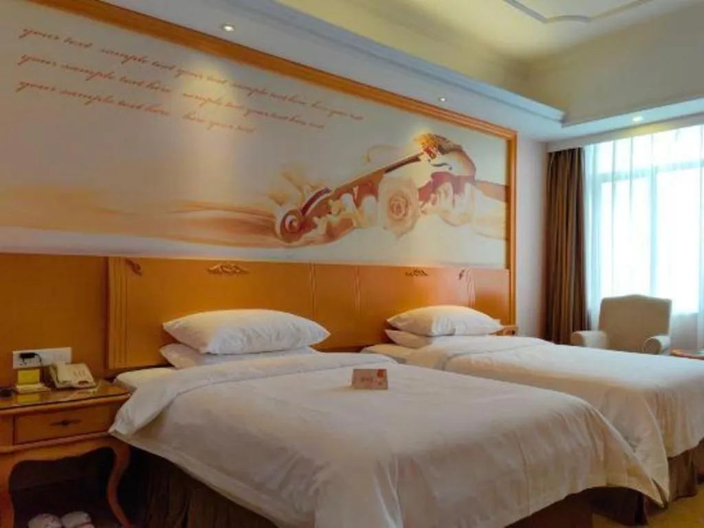 Bed in Vienna Hotel Guangdong Dongguan Chengnan Station