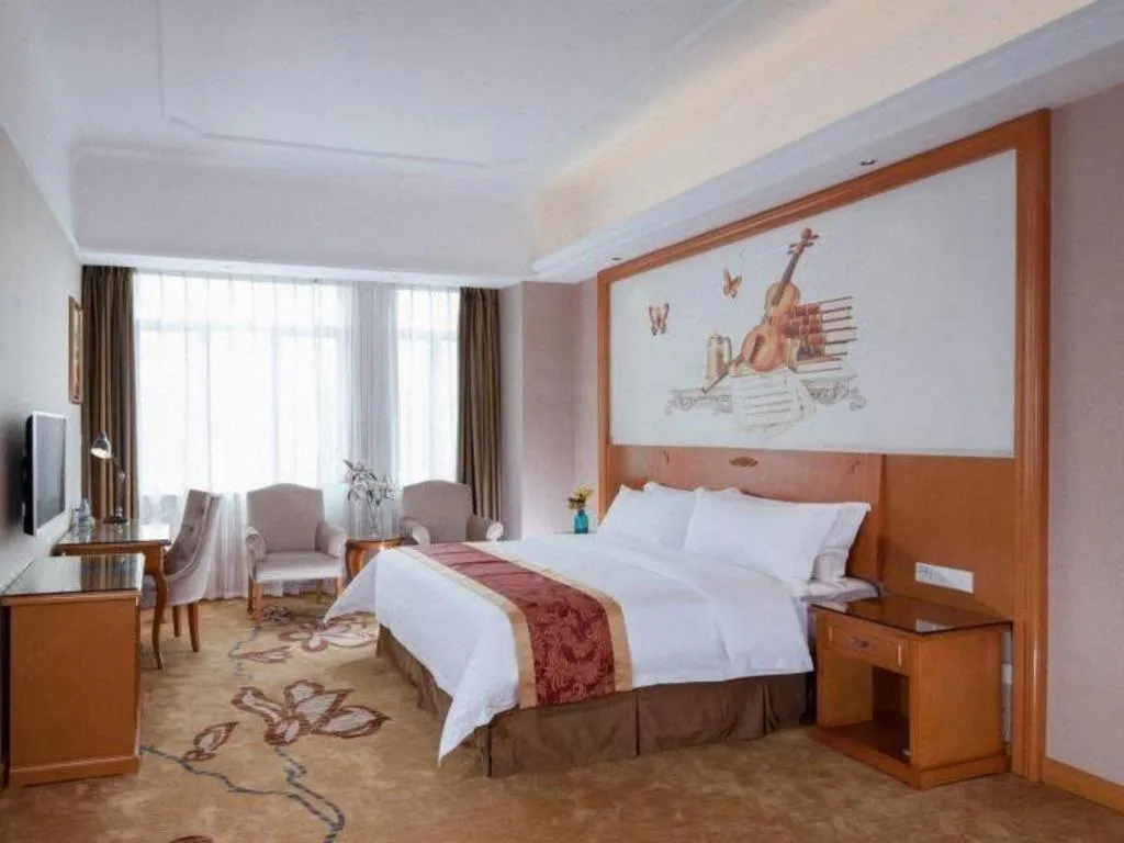 Bed in Vienna Hotel Guangdong Dongguan Chengnan Station