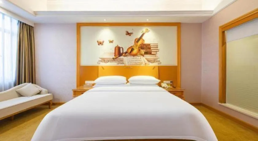 Bed in Vienna Hotel Guangdong Dongguan Chengnan Station
