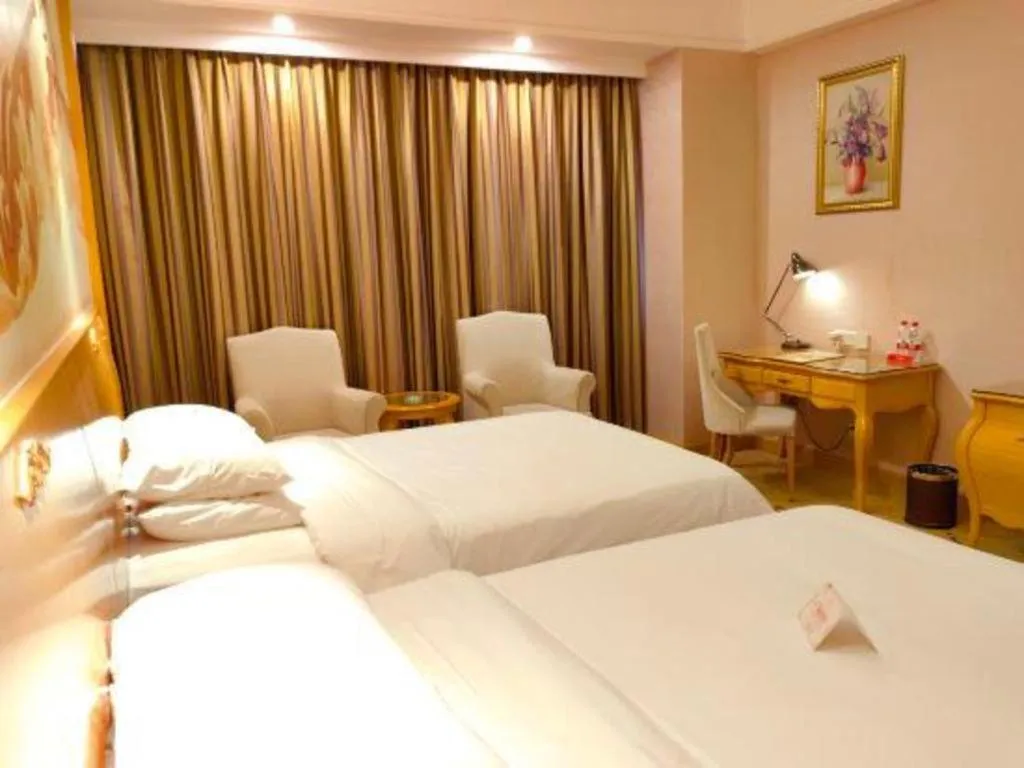 Bed in Vienna Hotel Guangdong Dongguan Chengnan Station