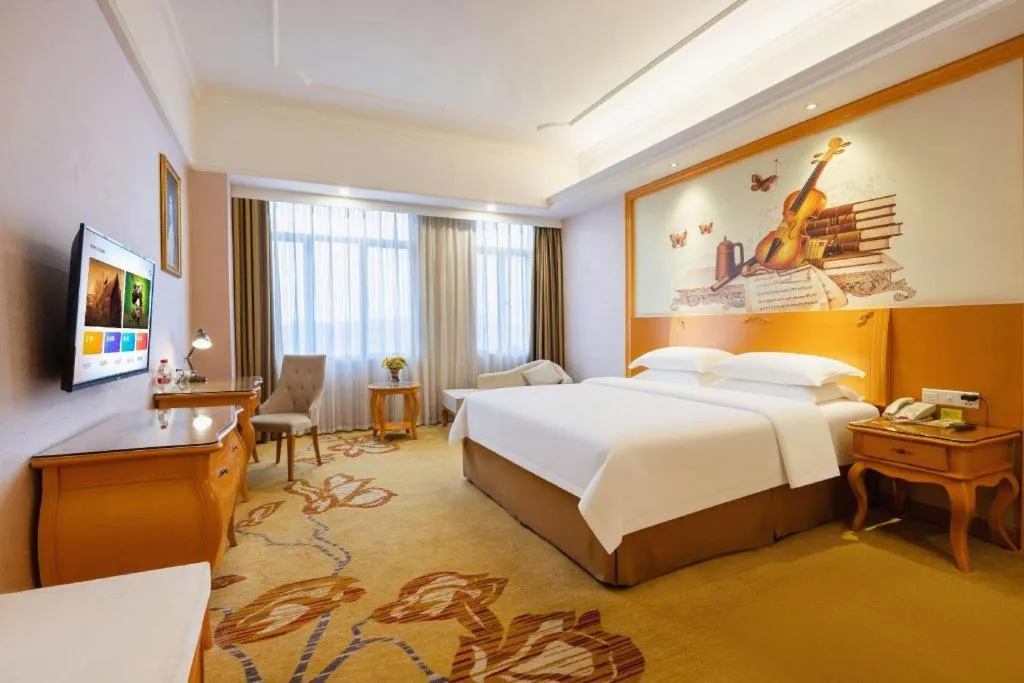 Bed in Vienna Hotel Guangdong Dongguan Chengnan Station