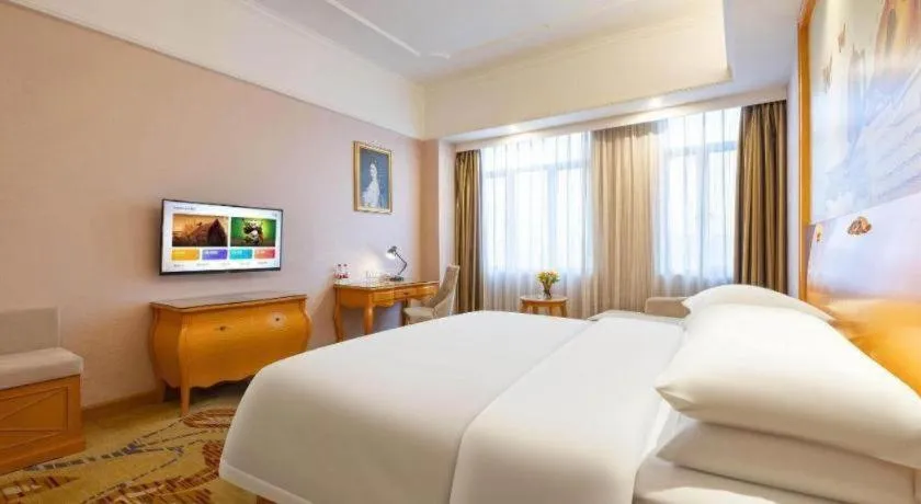 Bed in Vienna Hotel Guangdong Dongguan Chengnan Station