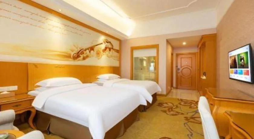 Bed in Vienna Hotel Guangdong Dongguan Chengnan Station