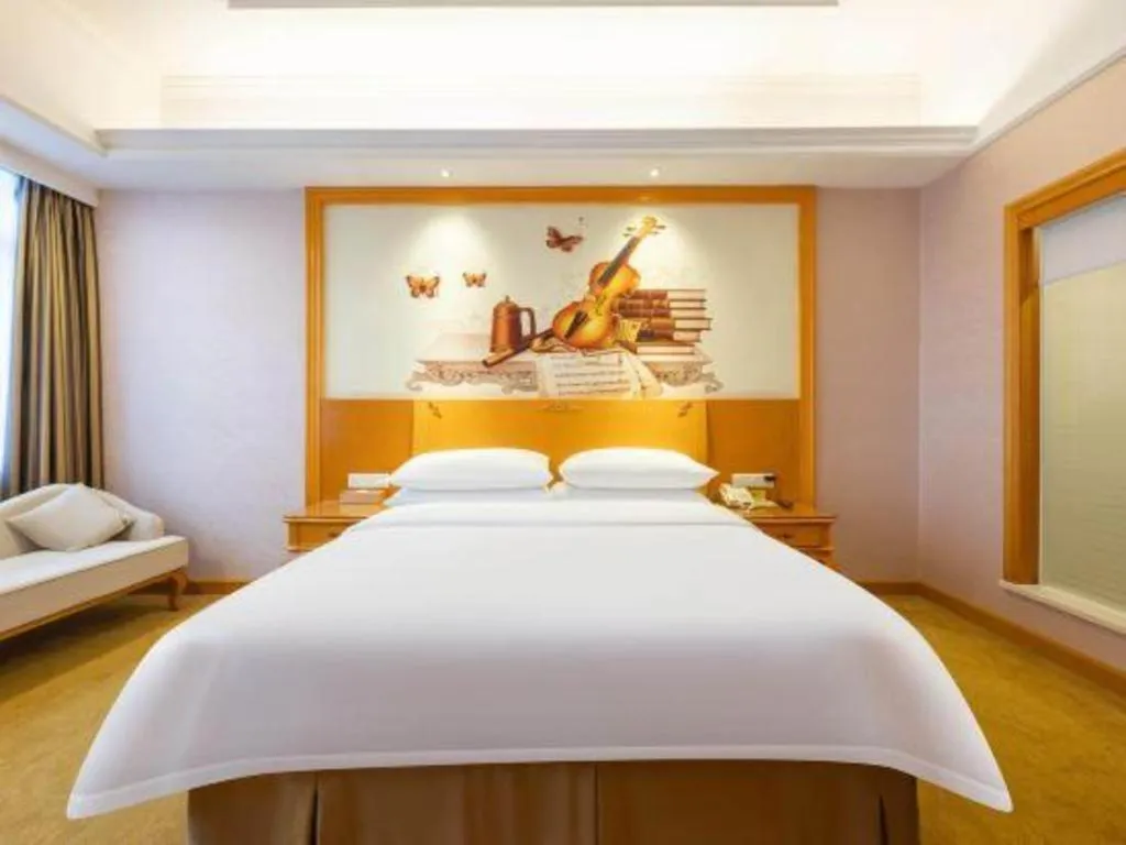 Bed in Vienna Hotel Guangdong Dongguan Chengnan Station
