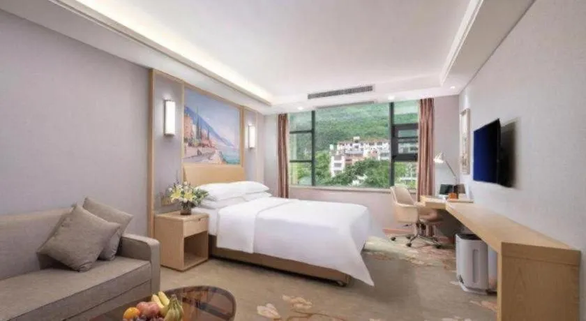 Bed in Vienna Hotel Guangxi Hechi Jinchengjiang Baima Street